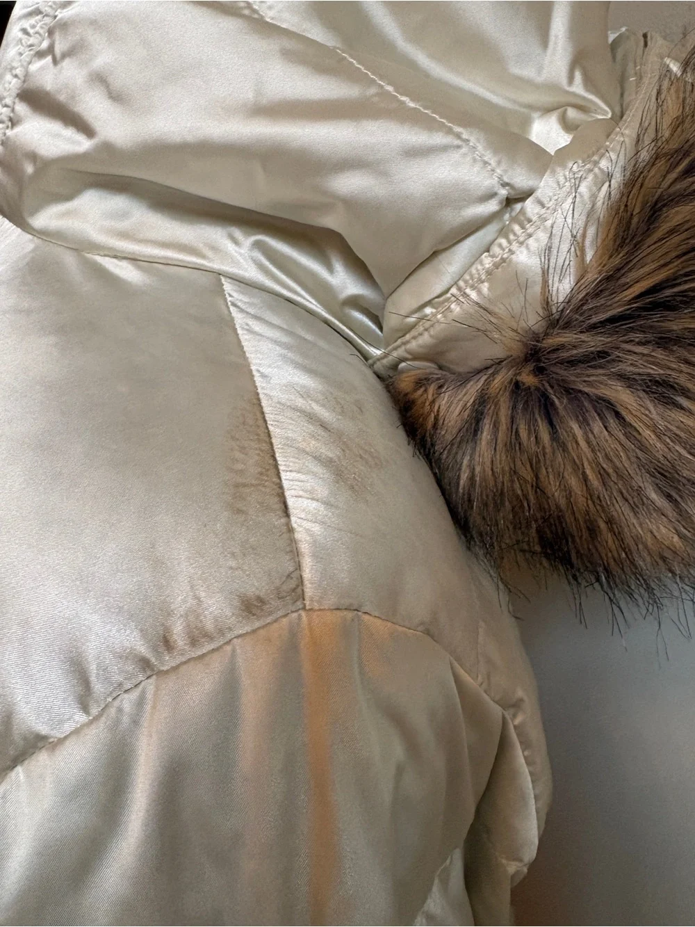 The North Face Girls champagne-colored puffer jacket